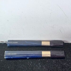 Two Estée Lauder Powder Brushes